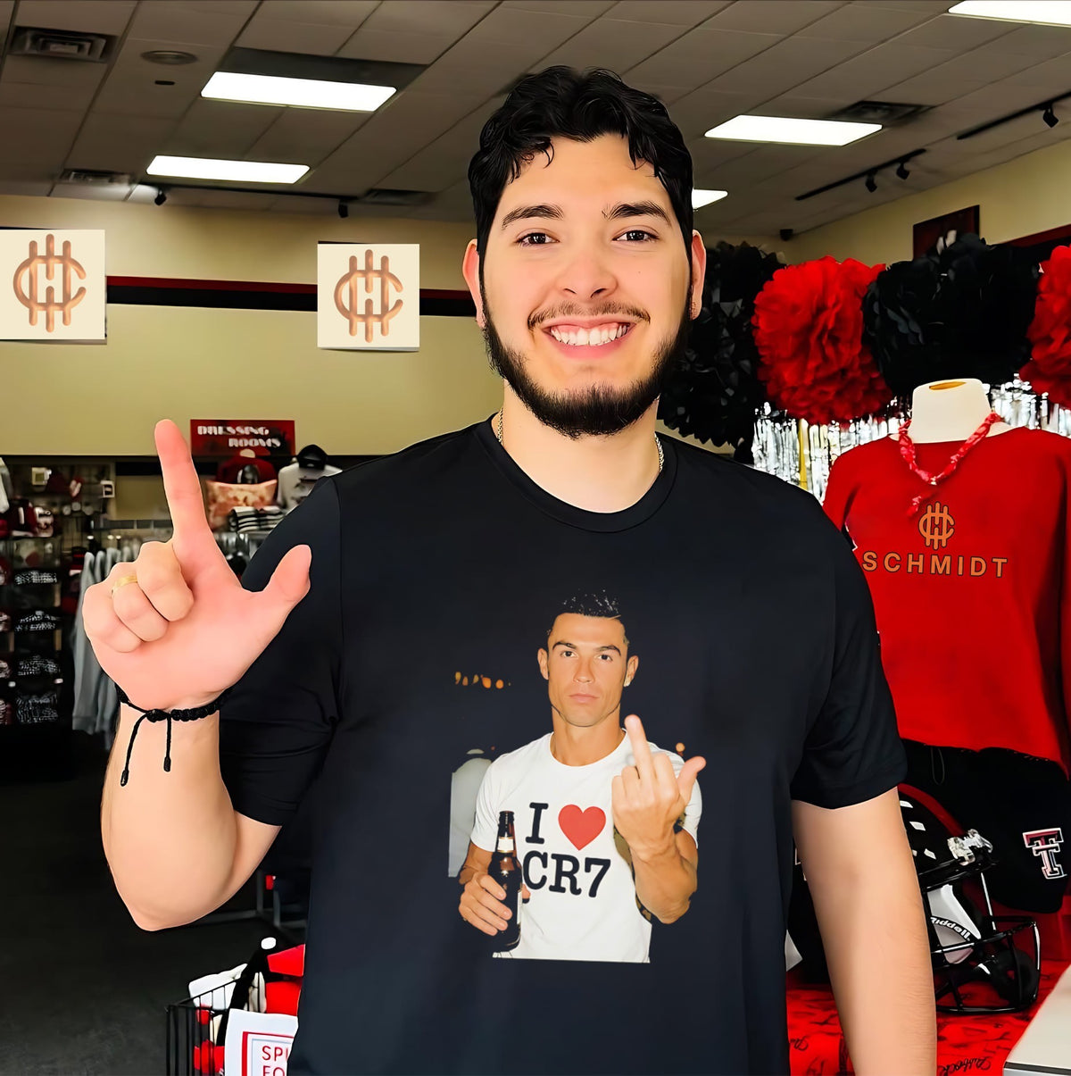 Cristiano Ronaldo holding beer middle finger shirt