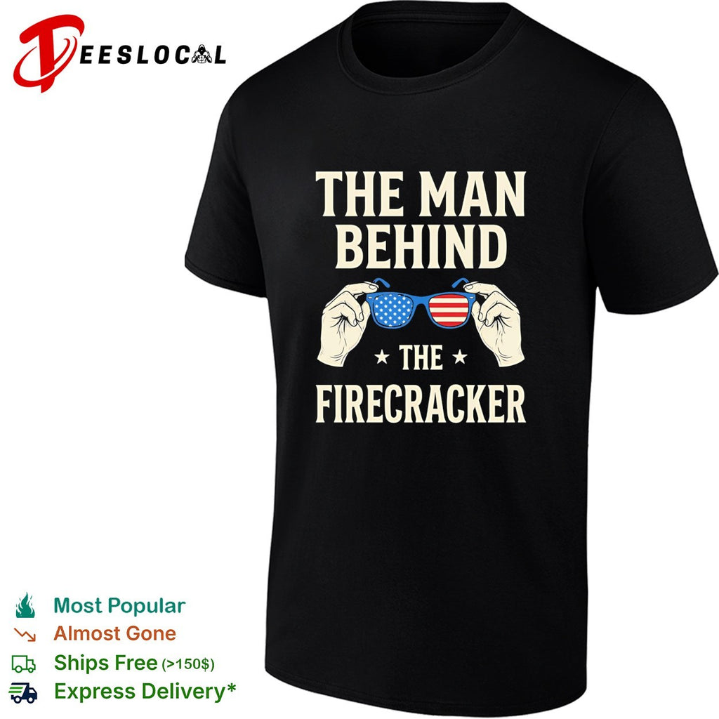Holding sunglasses with USA flag pattern the man behind the firecracker retro shirt