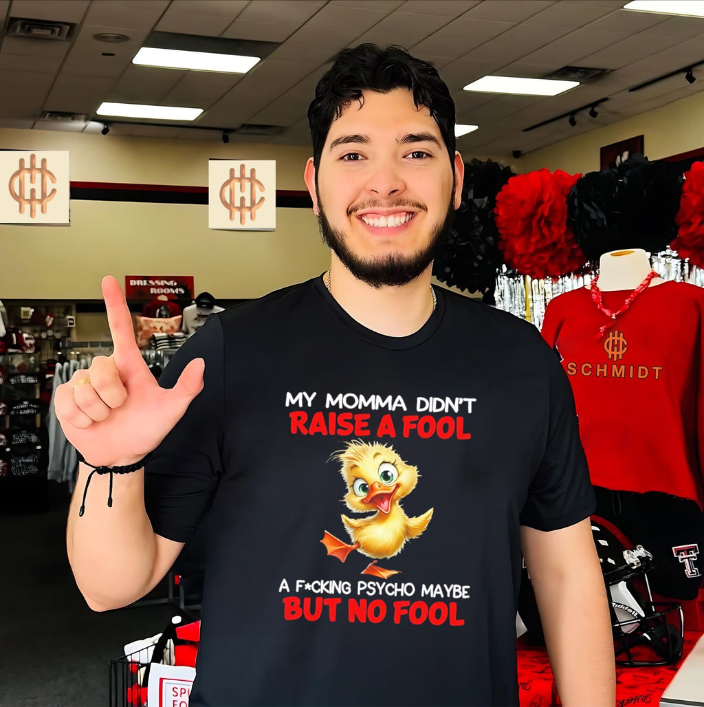 My momma didn’t raise a fool a fucking psycho maybe but no fool cartoon duck shirt