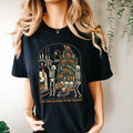 'Tis The Season To Be Creepy Skeletons Decorating Halloween Black Unisex T-Shirt