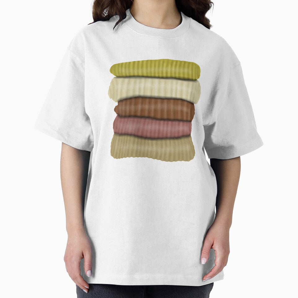 Pile of sweaters by Becky-Marie
