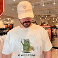 We water at dawn cartoon gardening frog shirt