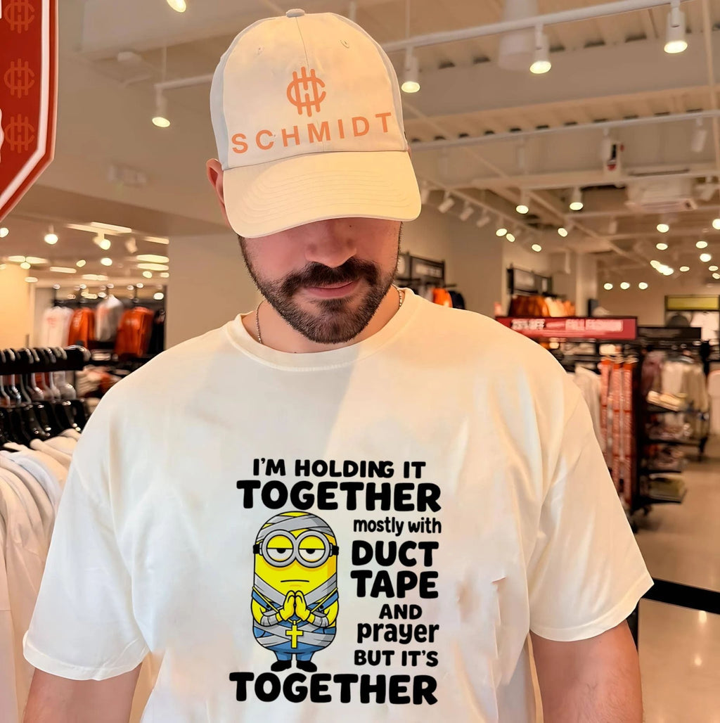 I’m holding it together mostly with duct tape and prayer but it’s together Minion shirt