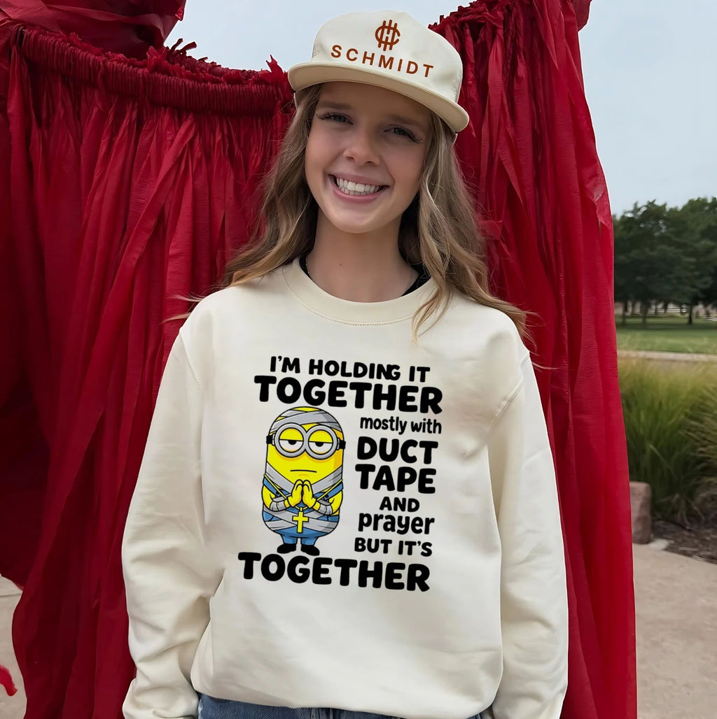 I’m holding it together mostly with duct tape and prayer but it’s together Minion shirt