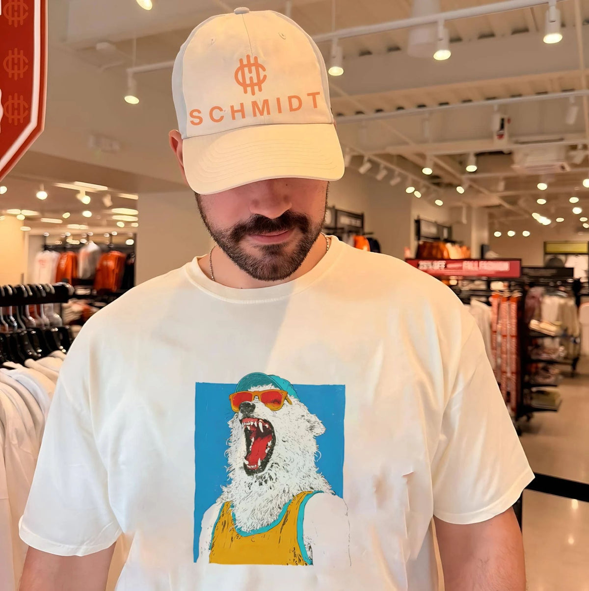 Polar bear wearing sunglasses and cap graphic shirt
